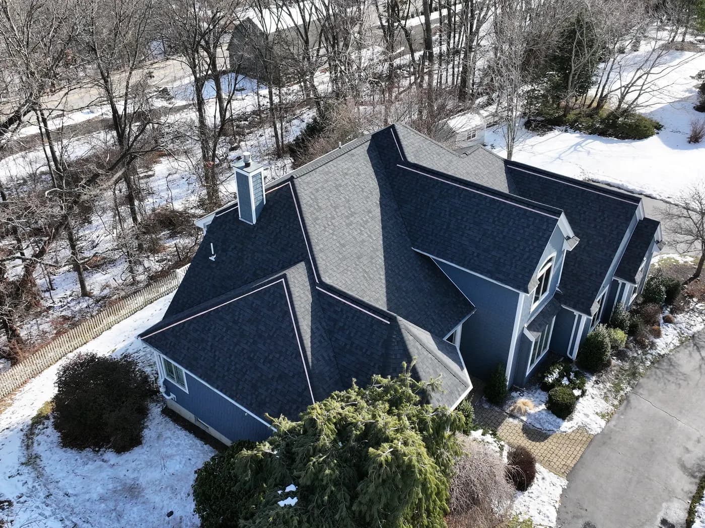 Completed residential roofing project in Massachusetts by Roofing Doctor