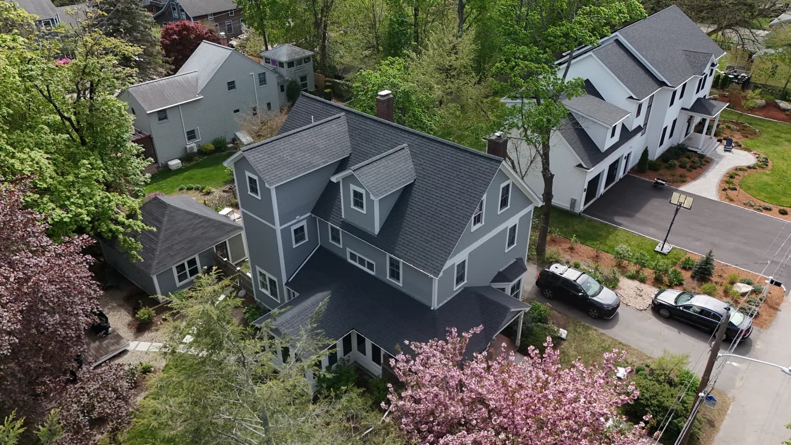 Completed roof replacement by Roofing Doctor, May 2025 — aerial view of new architectural asphalt shingles
