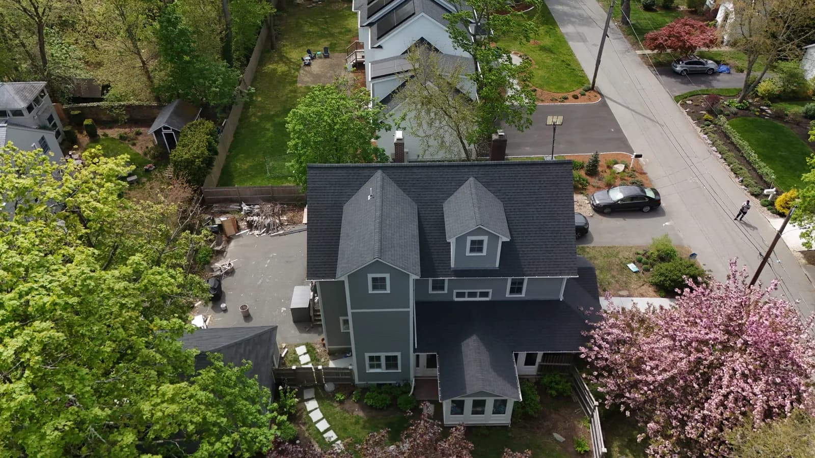 Completed roof replacement by Roofing Doctor, May 2025 — aerial view of new architectural asphalt shingles