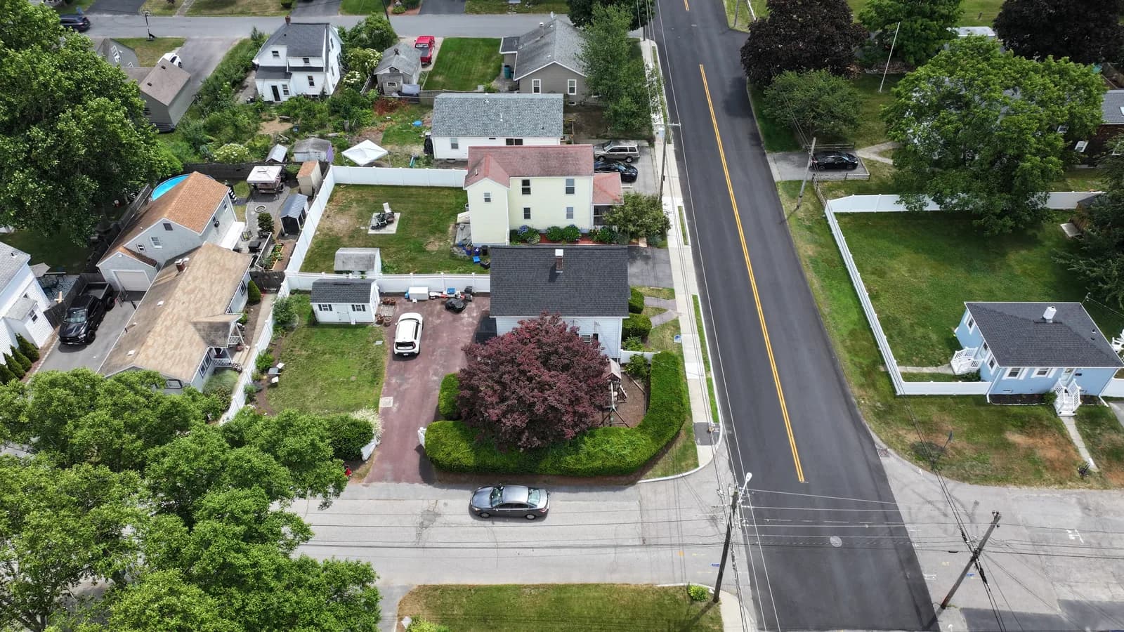 Completed roof replacement by Roofing Doctor, June 2025 — aerial view of new architectural asphalt shingles