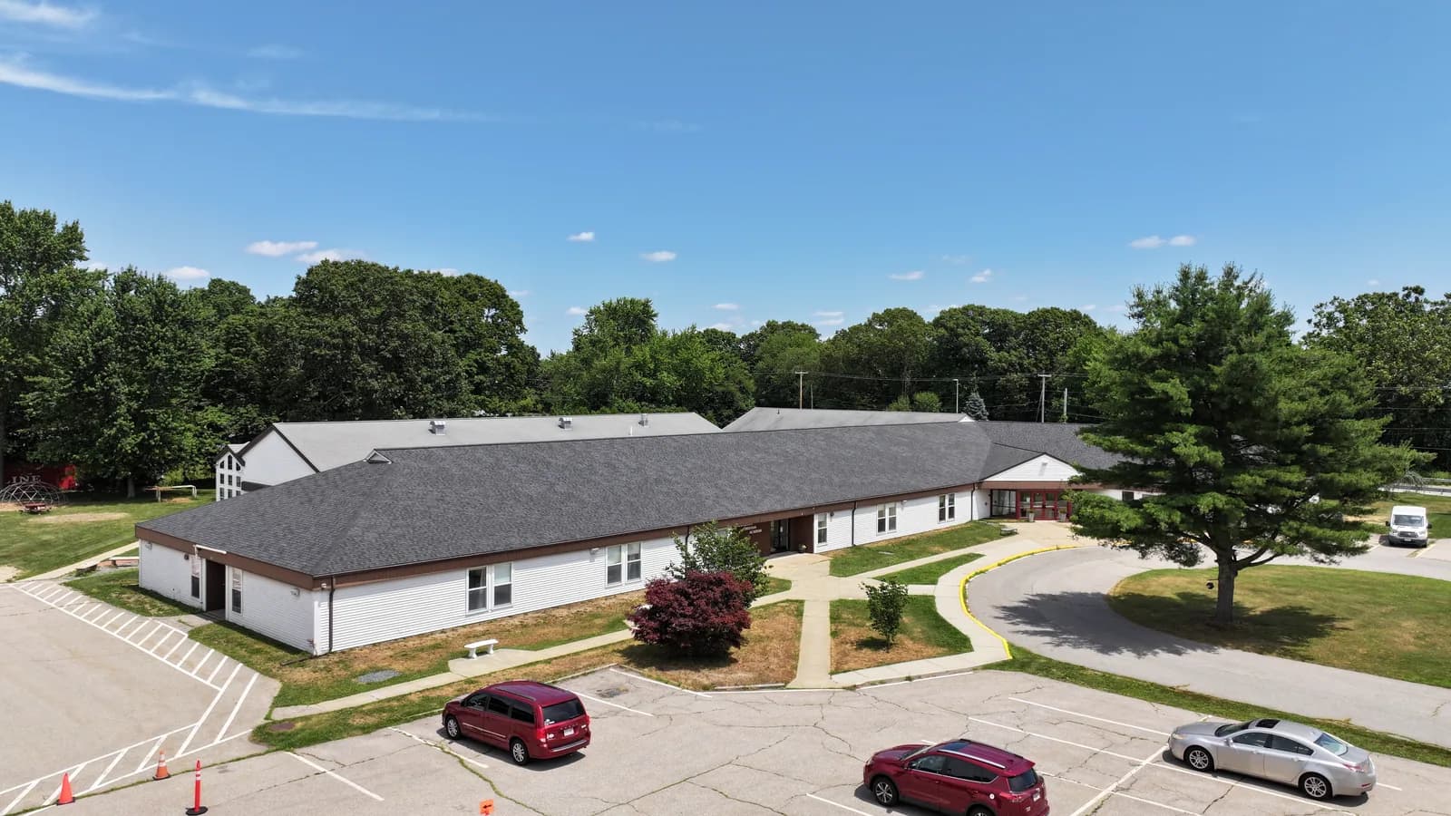 Completed roof replacement by Roofing Doctor, June 2025 — aerial view of new architectural asphalt shingles