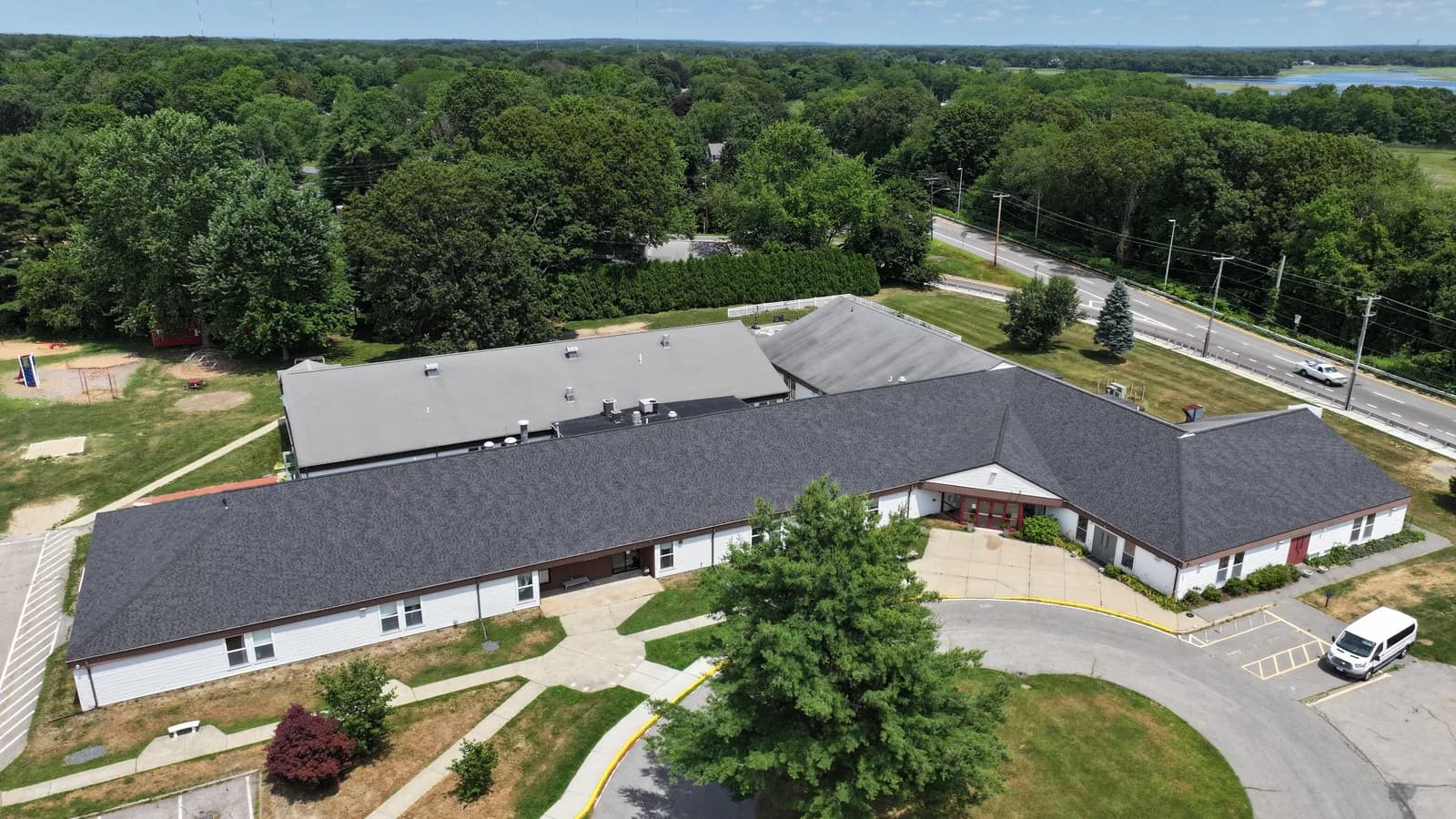 Completed roof replacement by Roofing Doctor, June 2025 — aerial view of new architectural asphalt shingles