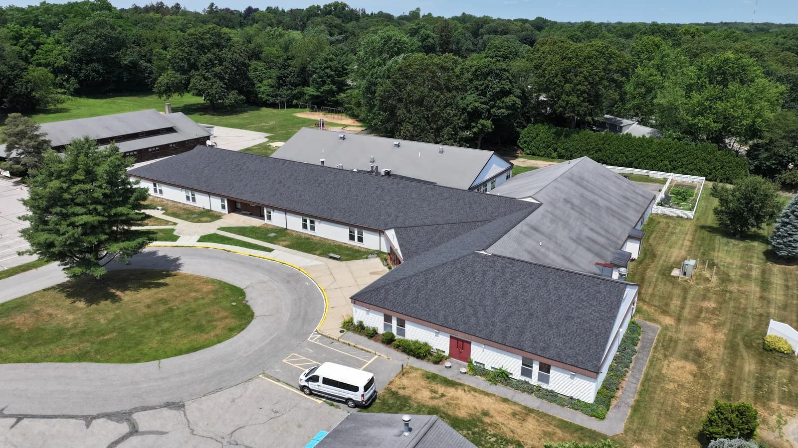Completed roof replacement by Roofing Doctor, June 2025 — aerial view of new architectural asphalt shingles