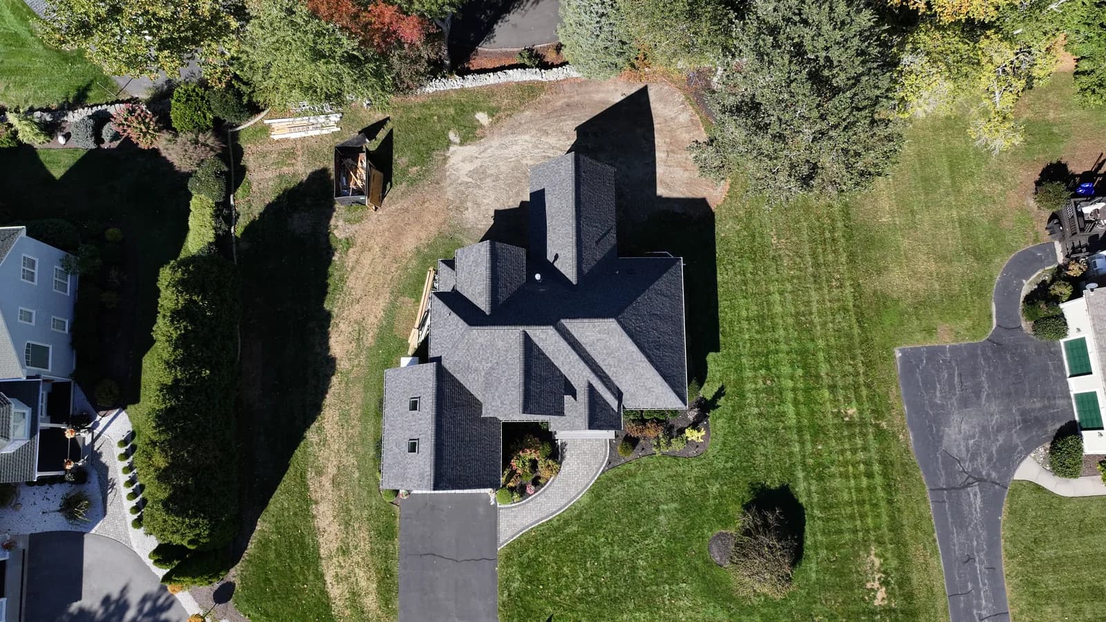 Completed roof replacement by Roofing Doctor, October 2025 — aerial view of new architectural asphalt shingles