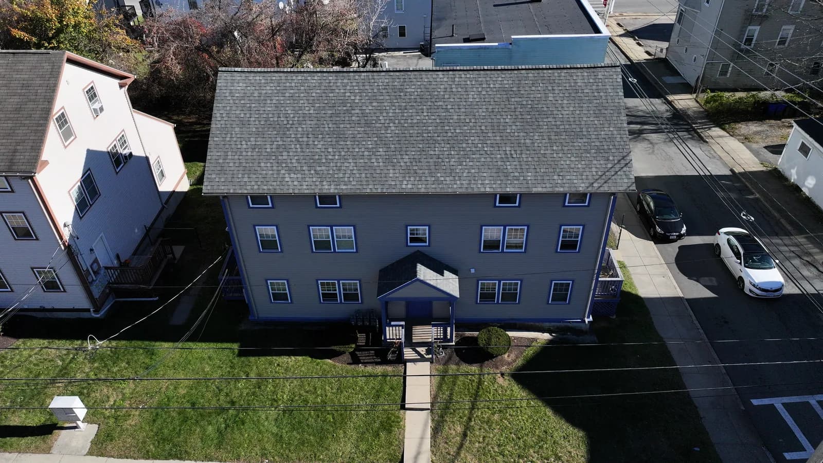Completed roof replacement by Roofing Doctor, November 2025 — aerial view of new architectural asphalt shingles