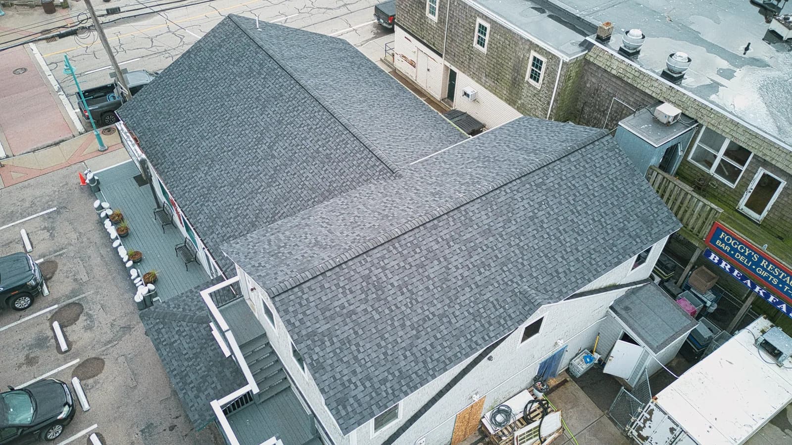 Completed roof replacement by Roofing Doctor, February 2024 — aerial view of new architectural asphalt shingles