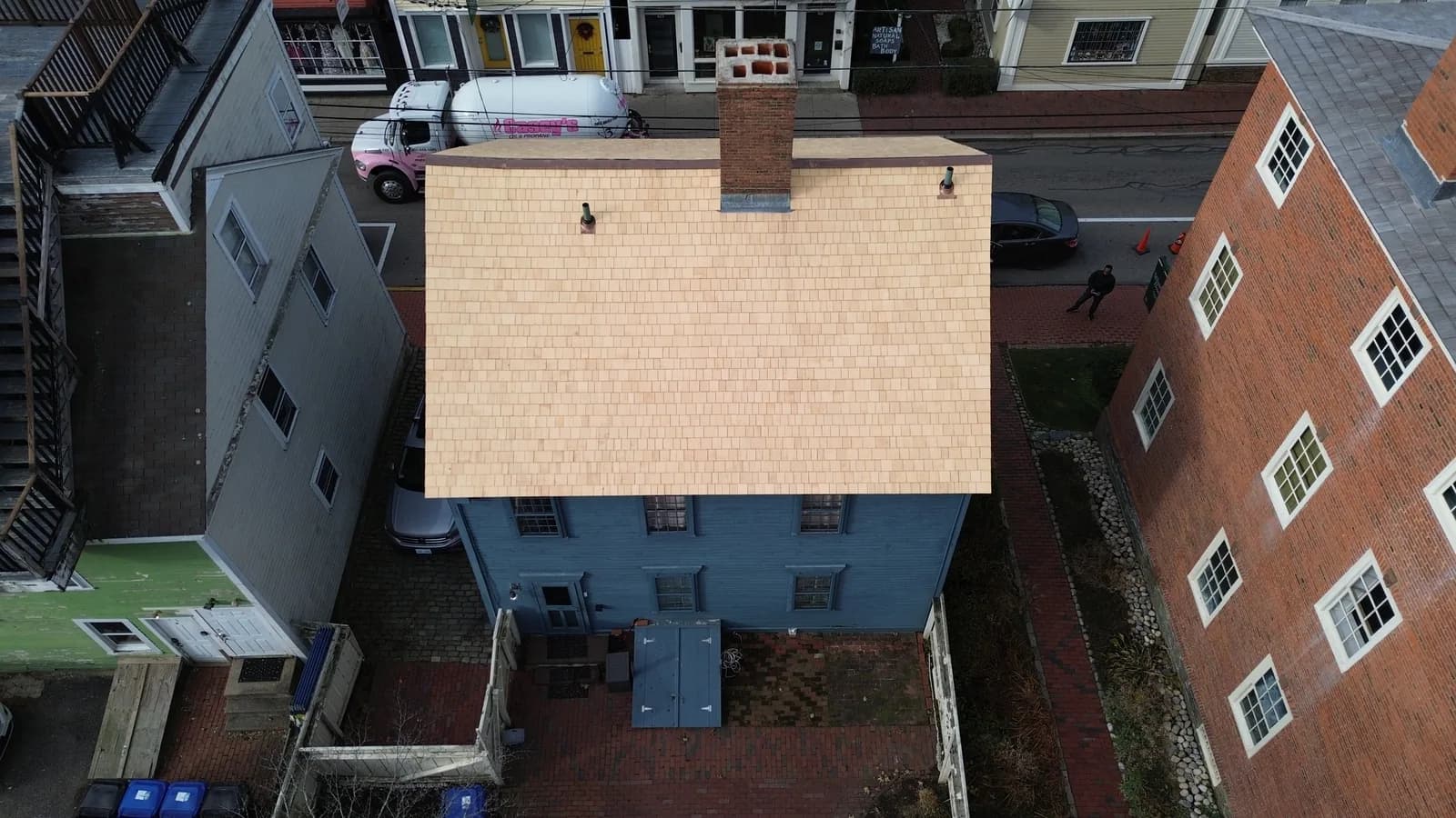 Completed roof replacement by Roofing Doctor, December 2023 — aerial view of new architectural asphalt shingles