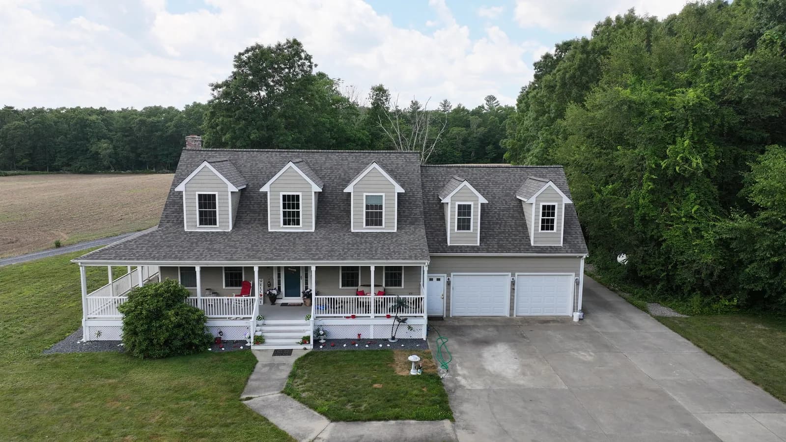 Completed roof replacement by Roofing Doctor, June 2025 — aerial view of new architectural asphalt shingles
