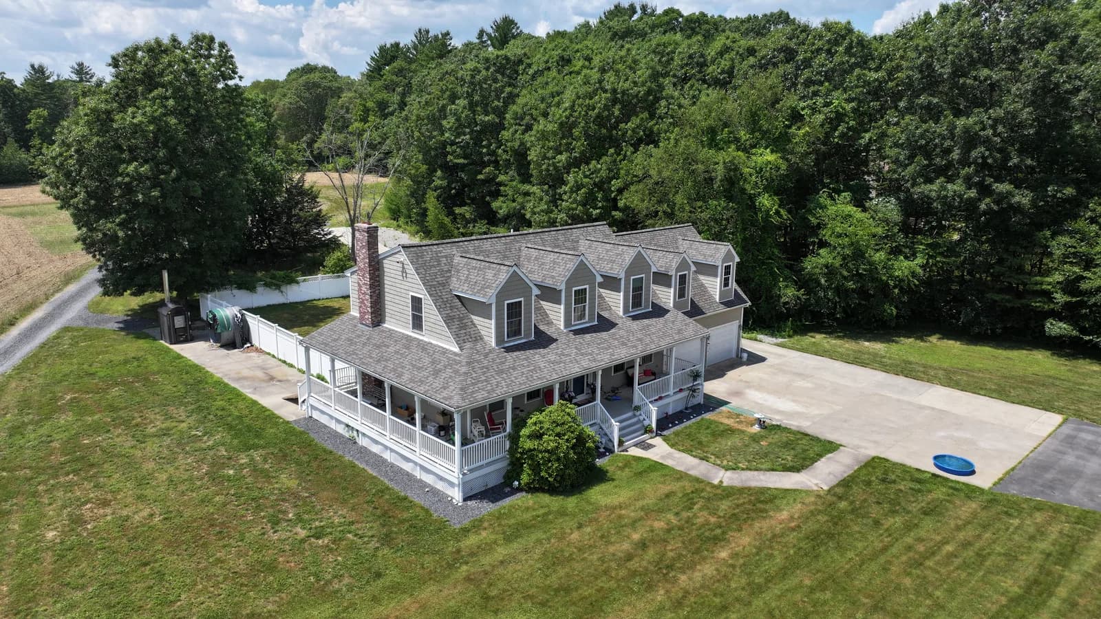 Completed roof replacement by Roofing Doctor, June 2025 — aerial view of new architectural asphalt shingles